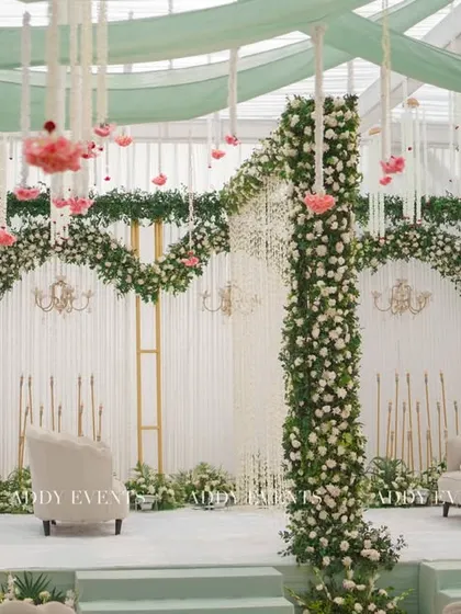 We honor traditions with elegance and grace. This serene Nikah stage, designed for Khan Sir's wedding, features a pastel green and white palette with delicate floral arches, showcasing our versatility in creating culturally rich and sophisticated events.