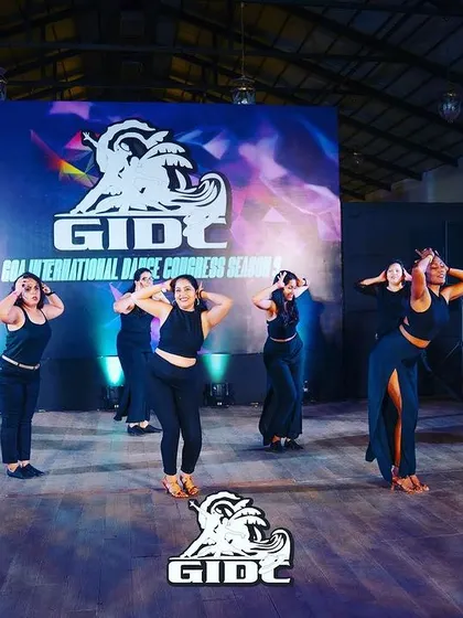 A synchronized pose from our GIDC routine, showcasing the attention to detail and precision we drill in our training sessions.
