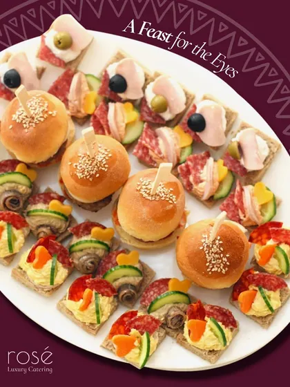 A feast for the eyes, this platter features an assortment of canapés and mini burgers. We focus on creating visually appealing appetizers that are as delightful to look at as they are to eat.