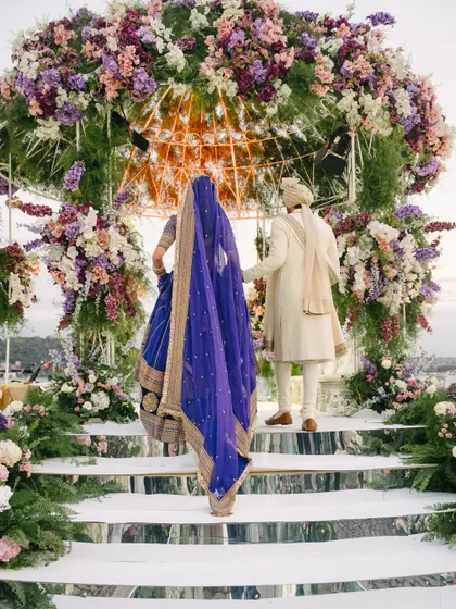 As the couple ascends the mirrored steps of their floral mandap, it symbolizes the beginning of their new journey together. We design these moments to be as meaningful as they are magnificent.