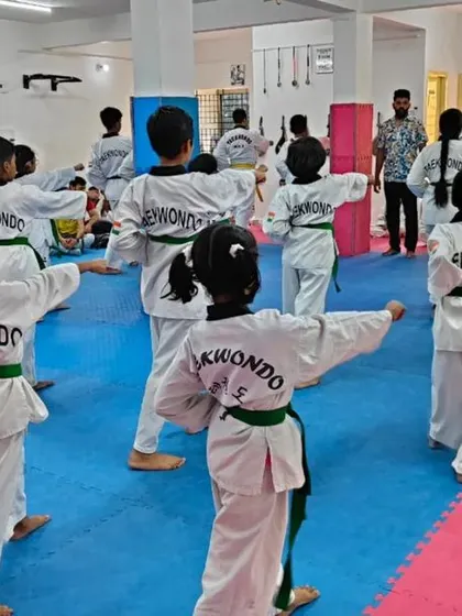 Another angle of the class practicing their forms.