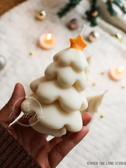 This whimsical Christmas tree candle, with its soft, rounded layers and a star on top, is one of my most playful holiday designs.