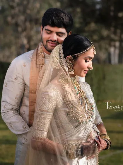 A tender moment between the bride and groom, captured beautifully. My makeup is designed to look flawless even in close, intimate shots.