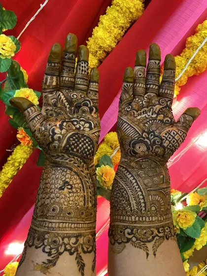 This is a detailed view of my intricate bridal henna work. Each design is unique, combining traditional patterns like paisleys and mandalas with fine-line fillers to create a stunning, full-coverage look for your special day.