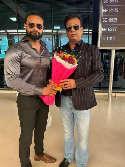 Arriving at Patna airport to attend the Bihar State Karate Championship as Chief Guest, being welcomed by the state association president.