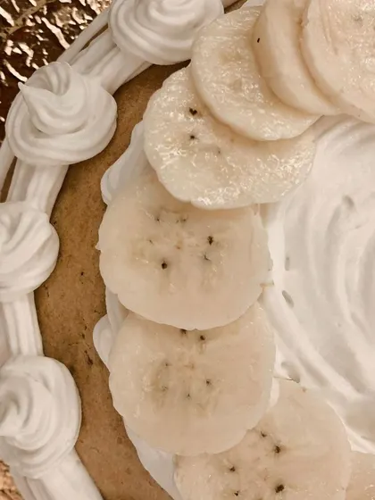 A close-up on the fresh banana toppings. I only use fresh, ripe fruit in all my bakes to ensure the best flavor for your furry friend.