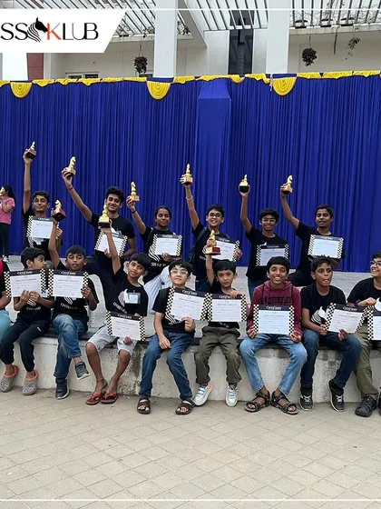 Our team of winners from the Universal First Age Category Children Chess Tournament. Their happy faces and trophies are a testament to their dedication and our coaching.