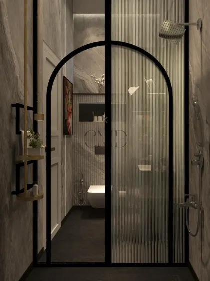 This master washroom in the Noida penthouse blends elegance and functionality with marble cladding, fluted details, and an arched fluted glass shower door.