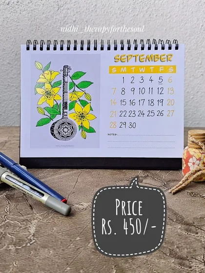 The September page, featuring a Tamburi with Tiger Lilies. This shot also highlights the price, making it easy for you to get the details.
