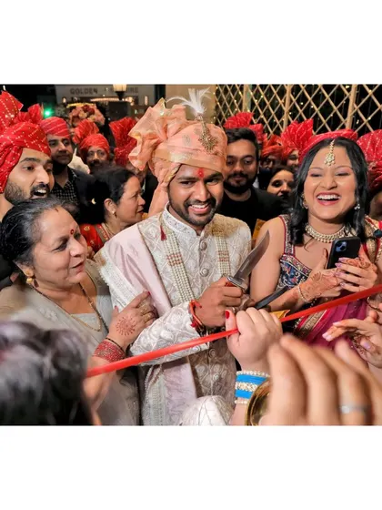 A fun and chaotic moment from the groom's entry and ribbon-cutting ceremony.