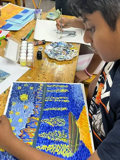 Inspired by Van Gogh, this student is recreating a famous artwork to learn about post-impressionistic brushwork and color palettes.