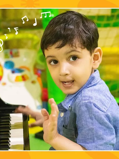 A mini maestro at work. Our toy piano is perfect for little ones to discover their musical talents.