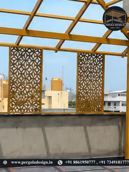 A detail shot of the decorative CNC panels on the yellow pergola, adding a touch of elegance and privacy to the structure.