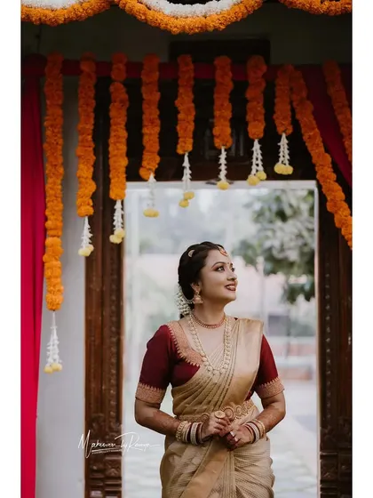Ashwini framed by the beautiful floral decorations.