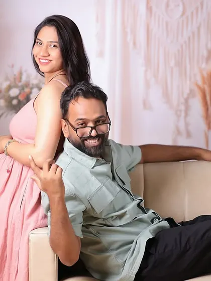 Another playful pose from the same maternity session, showing the happy anticipation of the parents-to-be.
