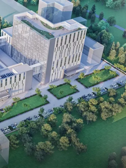 Another aerial perspective of the KRG Hospital, showcasing its relationship with the surrounding green landscape. The design creates a future-ready medical facility aligned with global benchmarks.
