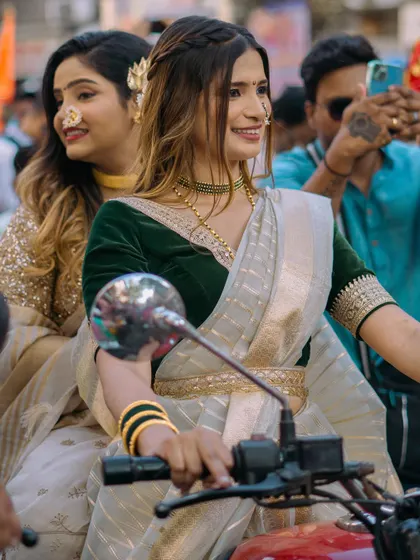 A collection of portraits from the Gudi Padwa parade in Girgaon. The series showcases women in stunning traditional attire, playing dhols and riding motorcycles, blending tradition with modernity.