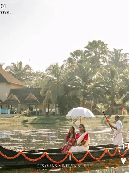 A destination wedding in the Kerala backwaters. The bride and groom arrive by traditional boat, a unique and picturesque touch that we love to incorporate into our destination wedding planning.