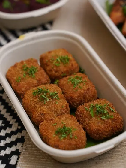 A fusion of Mumbai's favorite street food with a gourmet twist. My Pav Bhaji Croquettes have a crispy golden exterior and a creamy, spicy pav bhaji filling that is simply irresistible.