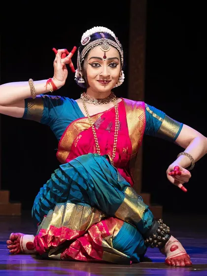 A close-up shot from the Kanasu festival, highlighting the intricate details of the costume, jewelry, and expressive abhinaya.