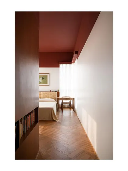 Another view of the kids' bedroom, highlighting the custom bed and headboard against the warm oak flooring. The design is meant to be a calm backdrop for sleep and play.