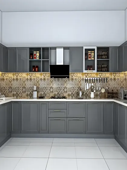 This expansive U-shaped kitchen in a uniform grey finish offers a sophisticated and cohesive look. The design includes open shelving for display, a beautiful patterned backsplash, and under-cabinet lighting to highlight the workspace.