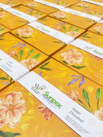 Festive corporate gifting made easy. These beautiful Dussehra gift boxes were customized with a branded sleeve for our client, Sunpac.