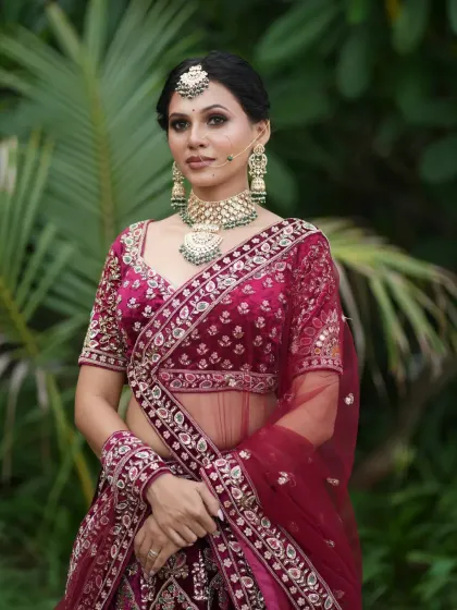 A classic pose, with the bride looking elegant and poised.