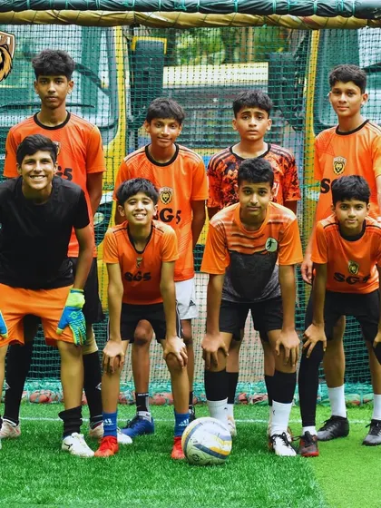 One of our youth teams posing before a match, looking focused and ready to compete.
