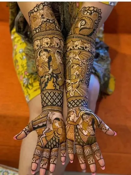 A complex storytelling mehndi with multiple scenes. This design includes portraits of the couple, their family, and traditional wedding rituals.