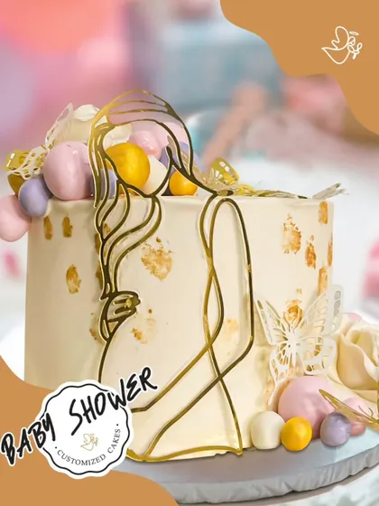 Welcoming a little angel with this beautiful baby shower cake for Mrs. Verma in Sainik Farms. The elegant gold line art of a mother-to-be and pastel accents make it a sophisticated choice.