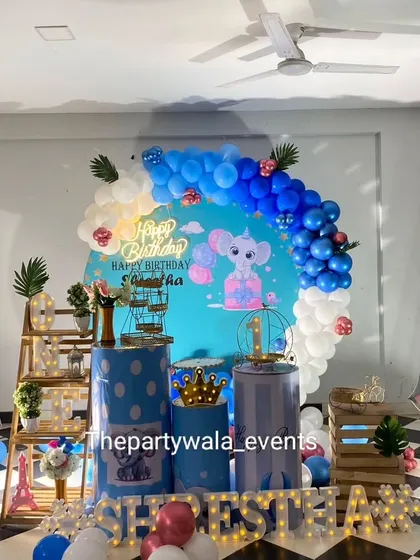 A close-up of the baby elephant setup, highlighting the light-up name and detailed decor.