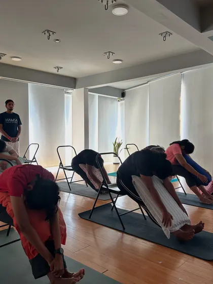 Another restorative pose from our women's health workshop, using chairs to allow for deep release and relaxation.