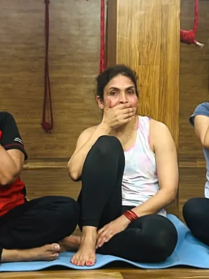 The three wise monkeys, yoga style. A playful moment of 'see no evil, speak no evil, hear no evil' during a studio session.