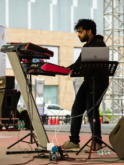 Our keyboard player works across two keyboards during the Phoenix Marketcity live set.