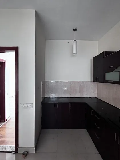 A view of the kitchen before we opened up the layout with a graceful arch.