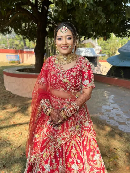A full-body shot of the bride, looking confident and happy.