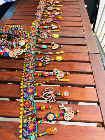 The full length of the 'TAMAARA' toran. This piece is a true celebration of tradition and mindful artistry, perfect for making your doorway feel special.