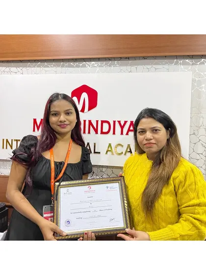 Another student receives her well-earned certificate. I am excited to see her flourish in her new career.