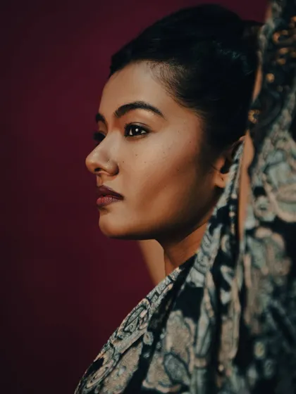 A profile shot that is both elegant and mysterious.
