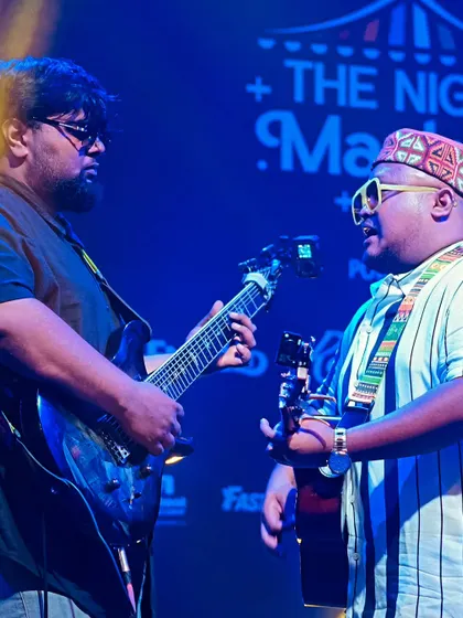A great shot of me and my bassist locking in during a performance. The rhythm section is the heartbeat of the band.