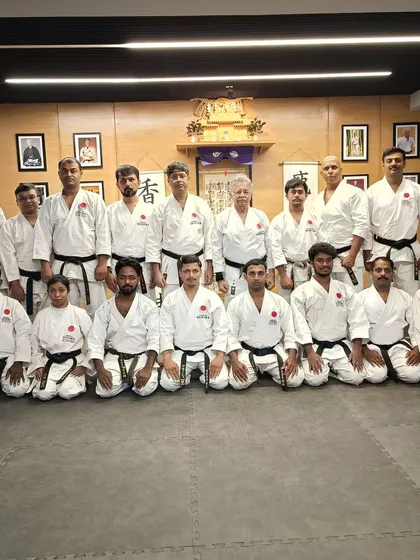 A group photo of the black belt instructors and senior members who participated in our special JKA training event, led by Sensei Anil Sinha.