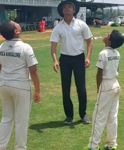 Every match, regardless of age group, is conducted with professional standards. An umpire officiates the coin toss for an Under-12 match, demonstrating our focus on fair play and structured competition from a young age.