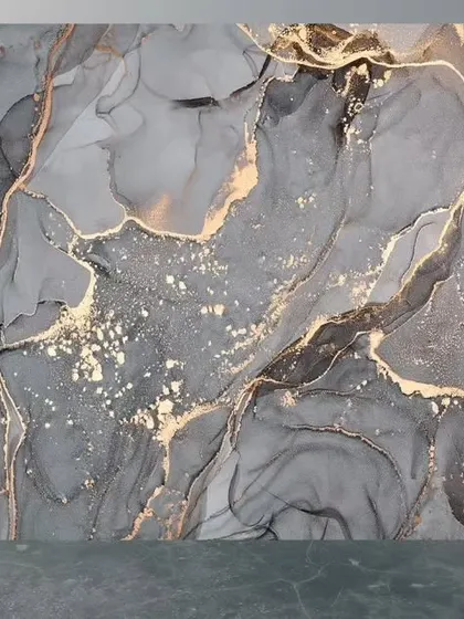 This abstract design features swirls of grey and black ink accented with shimmering gold foil. It's a perfect example of the luxurious, modern textures I can create to elevate your space.