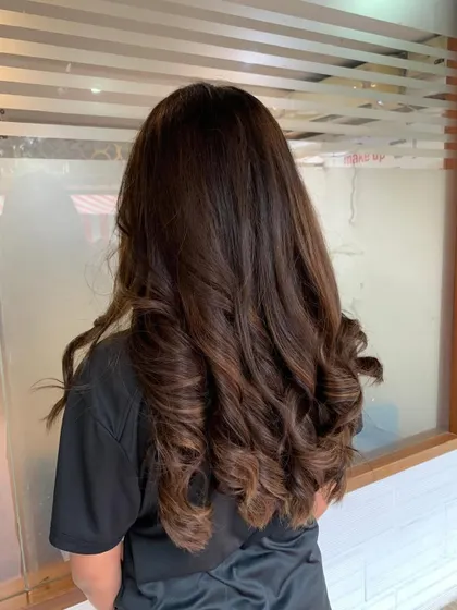 Another view of Anjali's long, highlighted hair.