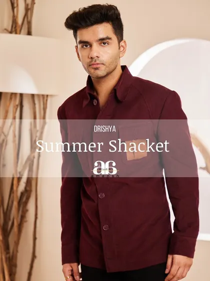 The maroon shacket is a versatile summer essential. This image shows its clean lines and modern aesthetic, perfect for effortless style in warm weather.