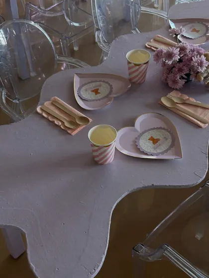 Another angle of the teddy bear tablescape, showing the striped paper cups and pink napkins that completed the look.