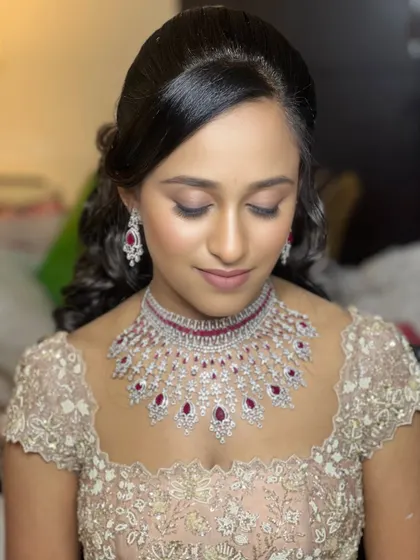 This close-up shows the flawless eye makeup with eyes closed. Mastering this level of detail is a key part of my professional training program.
