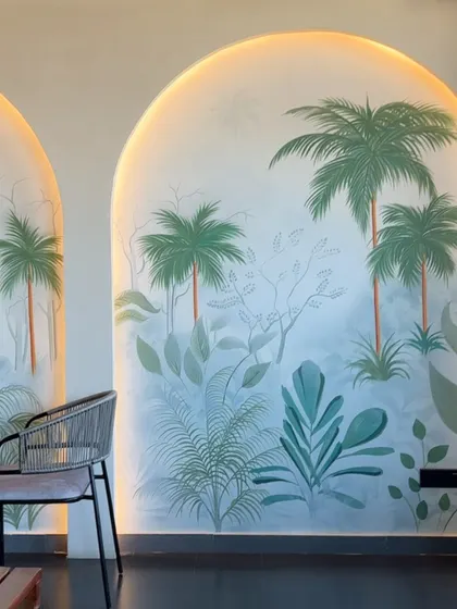 The finished mural, illuminated to highlight its delicate details.