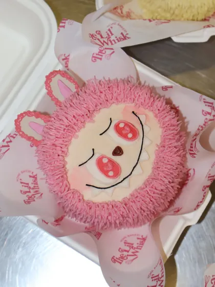 This pink Labubu character cake from our mystery box collection is just so cute with its heart-shaped eyes. We love how the textured piping gives these mini cakes a unique, fluffy appearance.